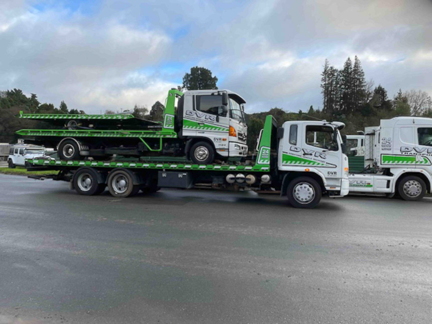 small tow truck on big tow truck